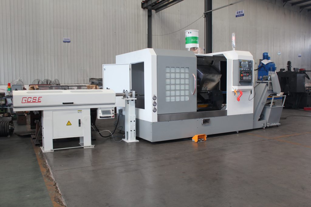 slant bed cnc lathe machine TCK56Y with bar feeder